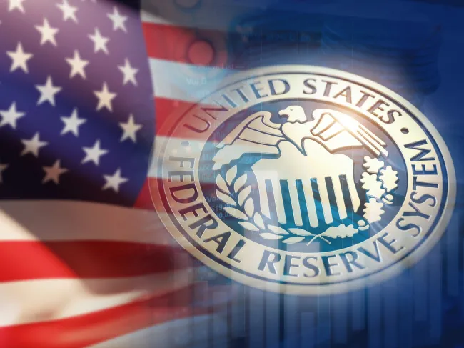 federal reserve logo and USA flag